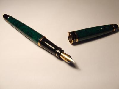 20081109034652-pluma-de-escribir.jpg